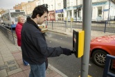 Man crossing traffic lights 