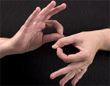 Hands undertaking sign language